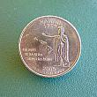 「アメリカ50州25セント硬貨」（The 50 State Quarters）のハワイ州硬貨。上部に50州目になった年号が