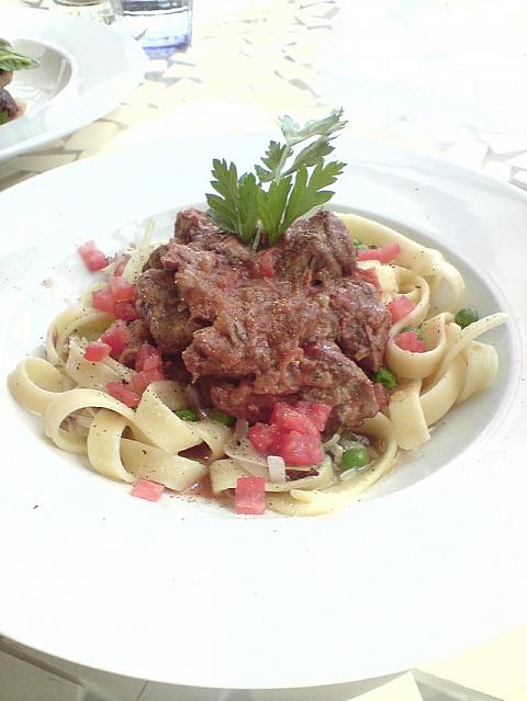 Fettuccine with Amelia Park slow cooked lamb, peas, lemon, garlic & parsley A$28.50