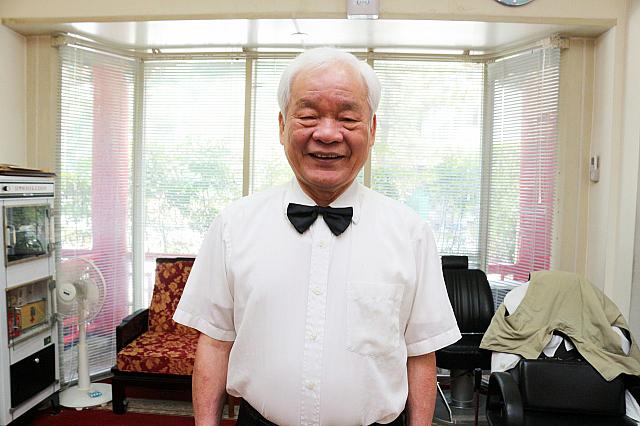 理容師の邱炎鐘さん