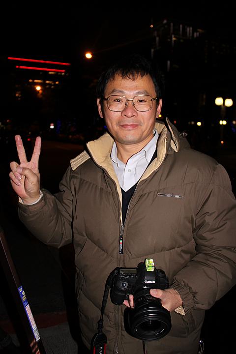張さん